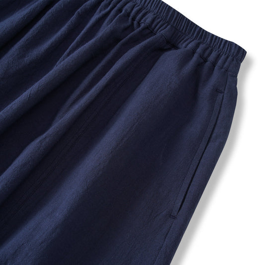 Side view of navy blue women's skirt with pockets