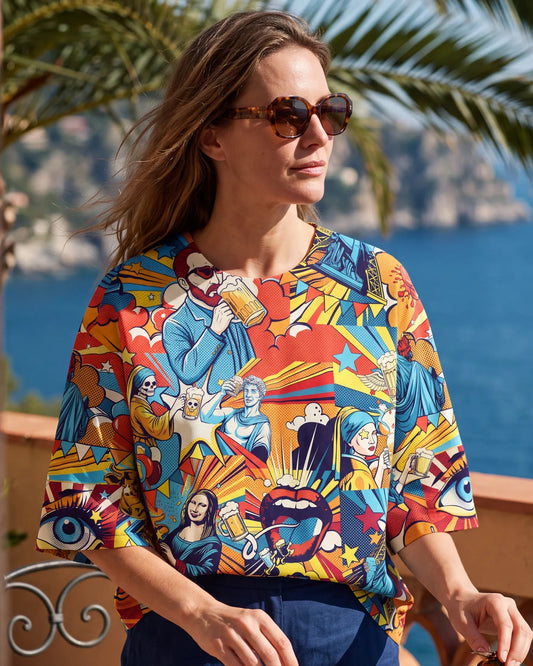 Women's green blouse with Aloha art and beer pop collage, button-back