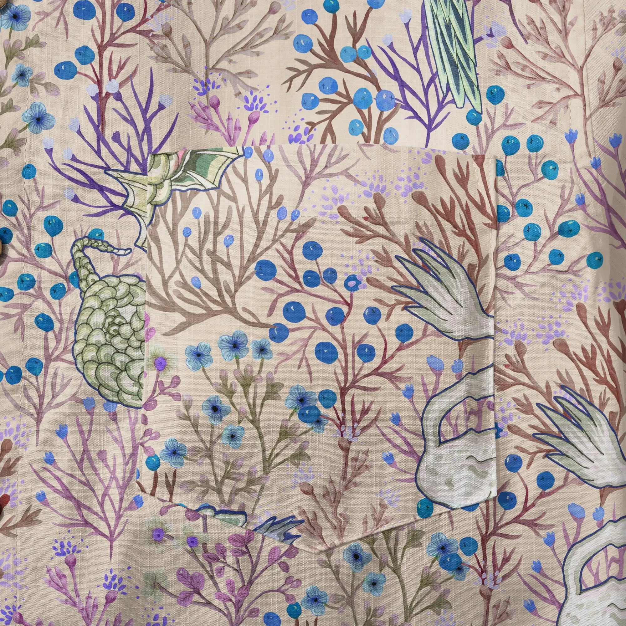 Brown Hawaiian shirt with button-up collar and floral design