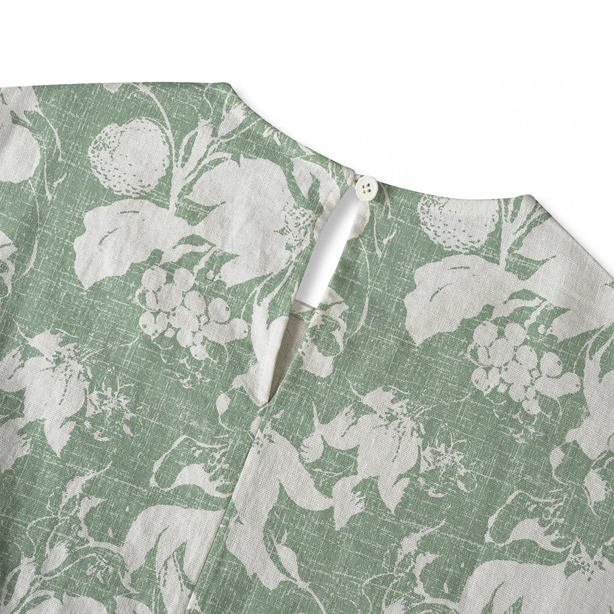 Model wearing Flower Verdant Memoirs Women's Blouse, green floral design