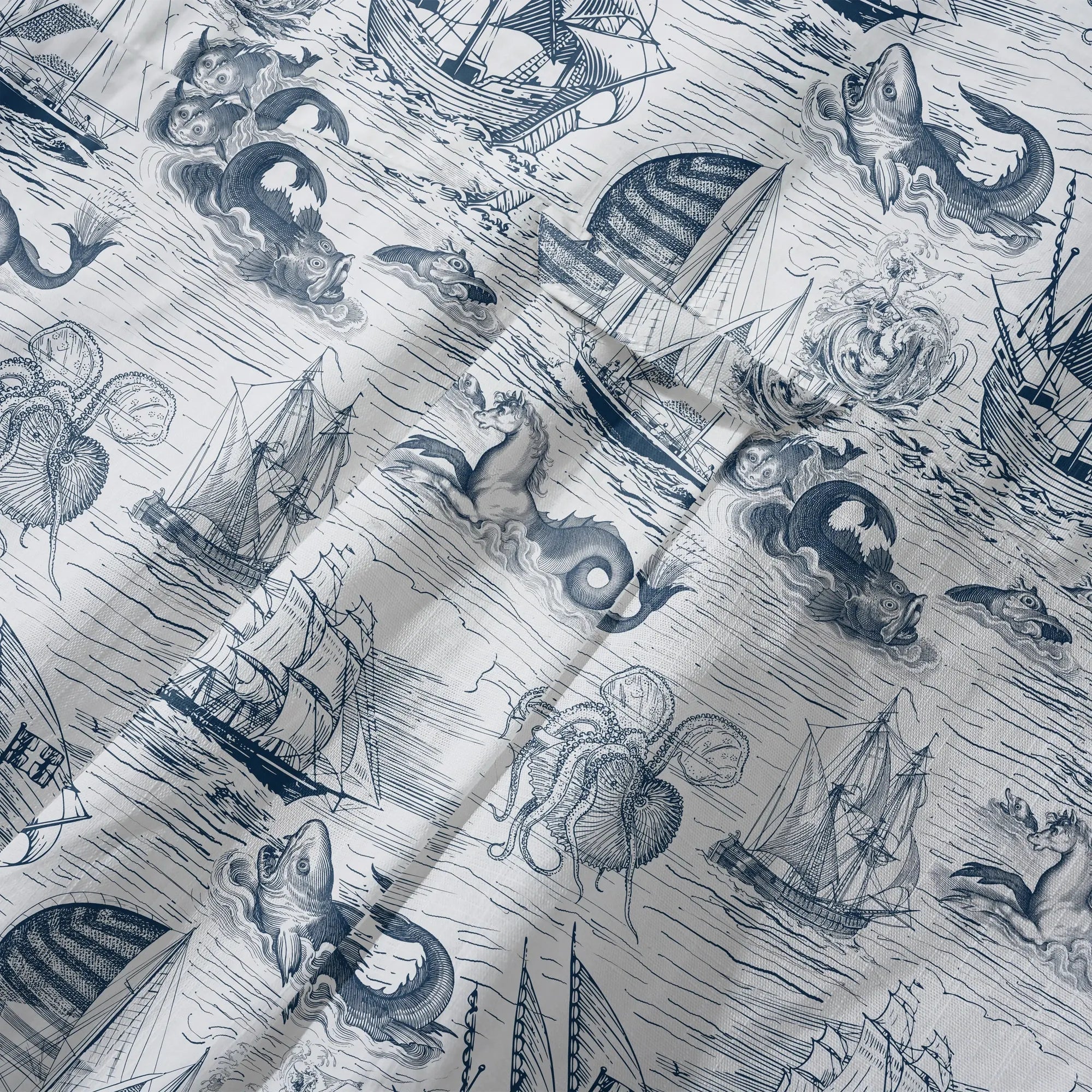Blue Hawaiian shirt featuring sailboats and sea creatures