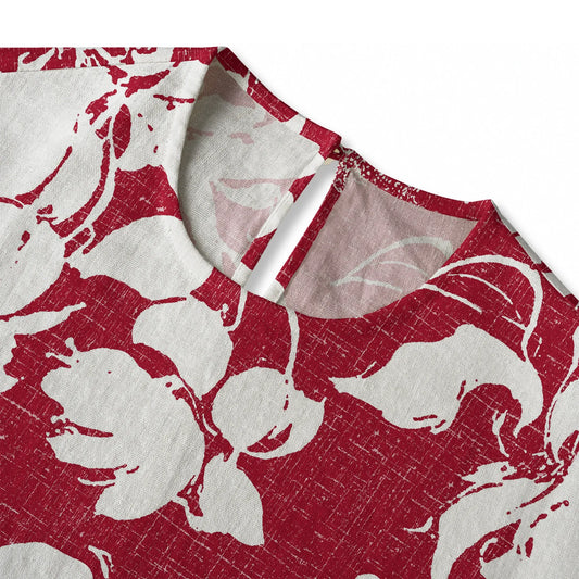 Back view of red floral women's blouse, button-back design