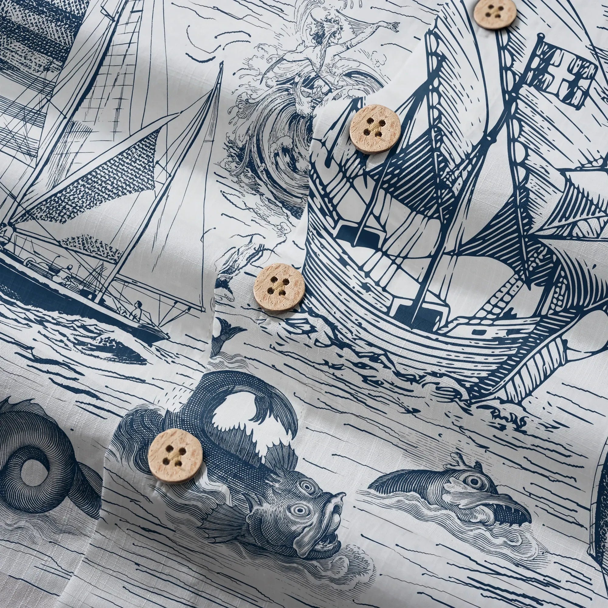Detail of button-up collar on blue Hawaiian shirt