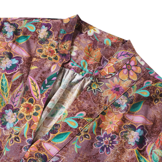 Back view of purple aloha artistic floral women's blouse