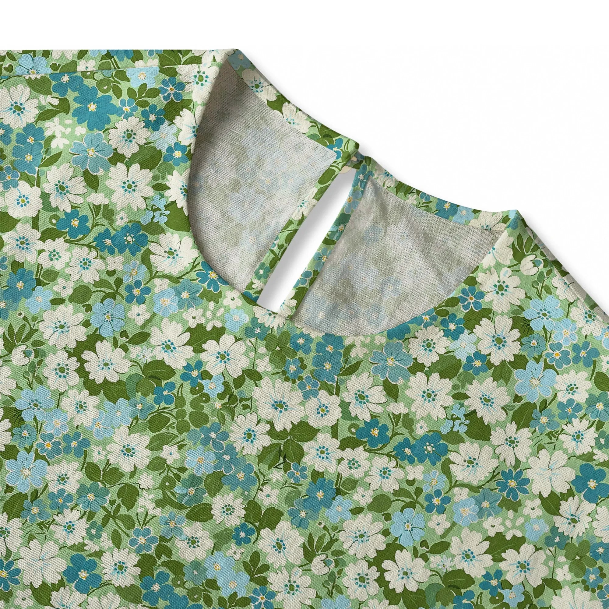 Back view of green floral blouse, elbow sleeve, women's