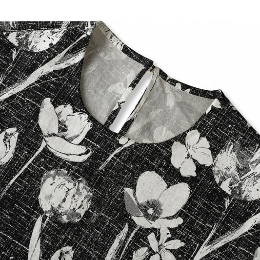 Women's black blouse with floral ink strokes, elbow sleeve