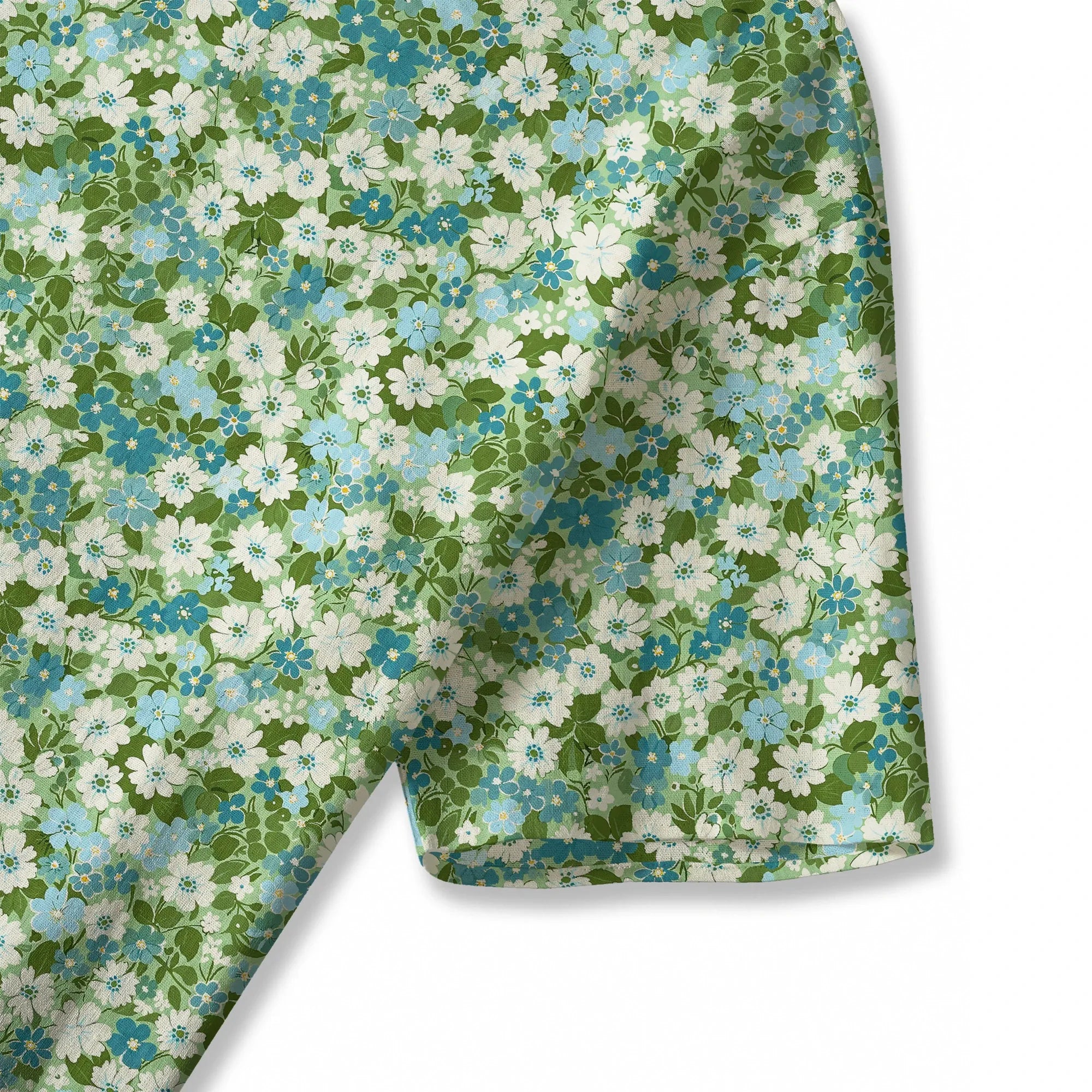 Close-up of floral pattern on green blouse, women's