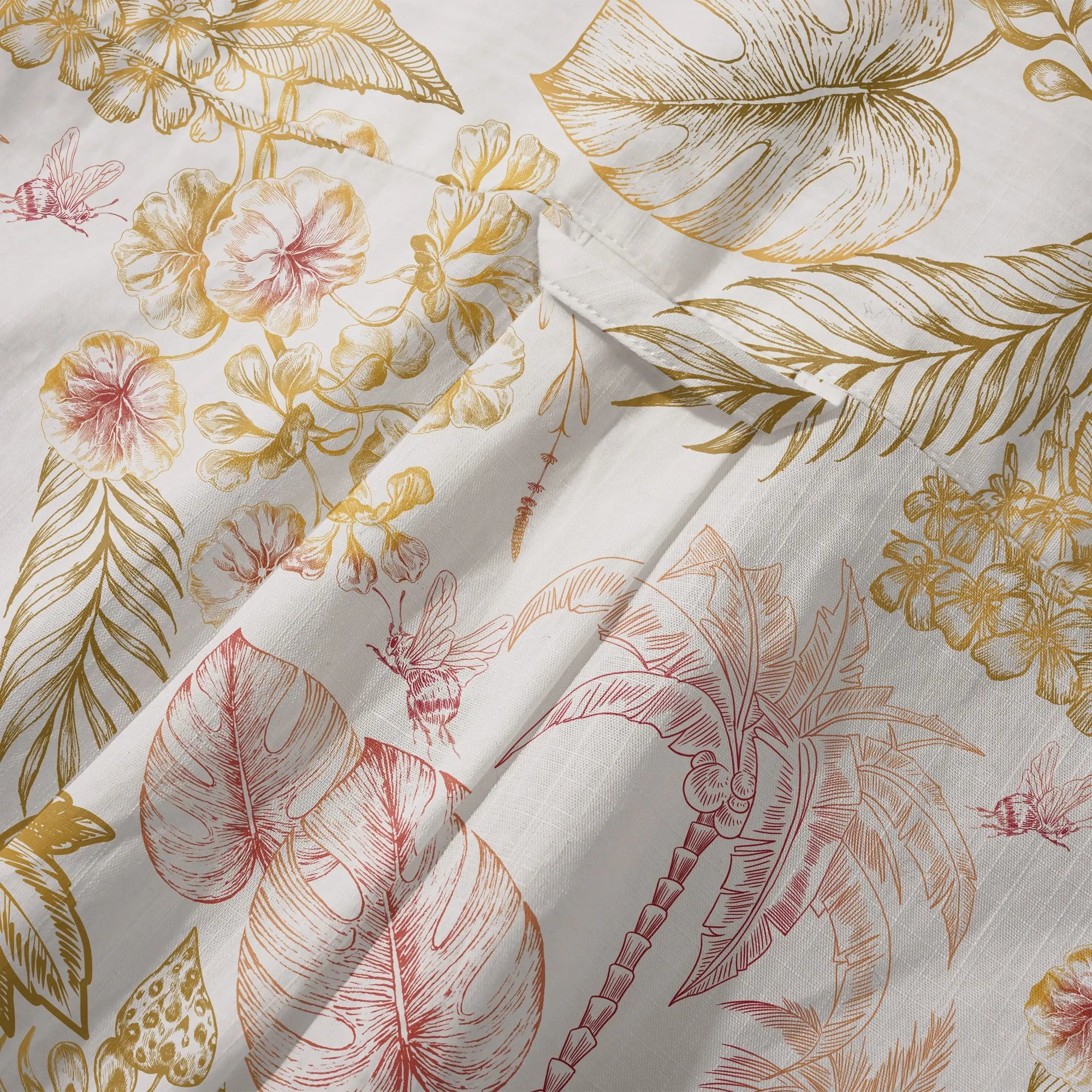 Detailed view of tropical floral design on men's shirt