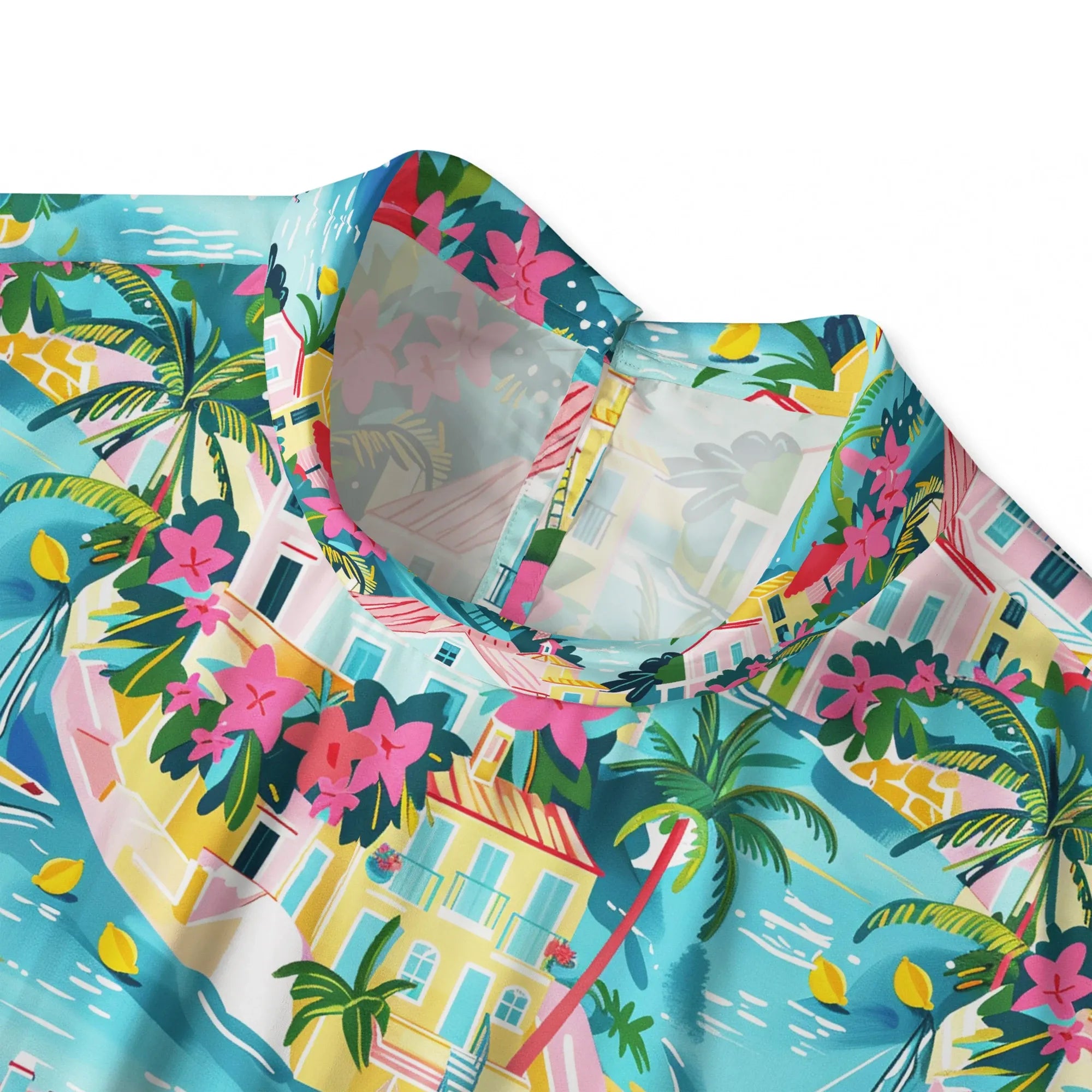 Back view of women's button-back blue blouse with tropical print